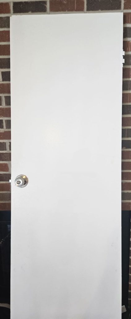 Picture of a white hollow core door from the 1970s